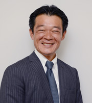 写真: 担当者 野村不動産 法人営業本部　ウェルスマネジメント二部　次長 須賀 芳浩